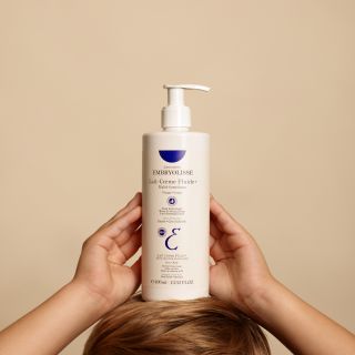 EMBRYOLISSE Lait-Crème Fluid Multipurpose Moisturizing Nourishing ķermeņa pieniņš, 400 ml